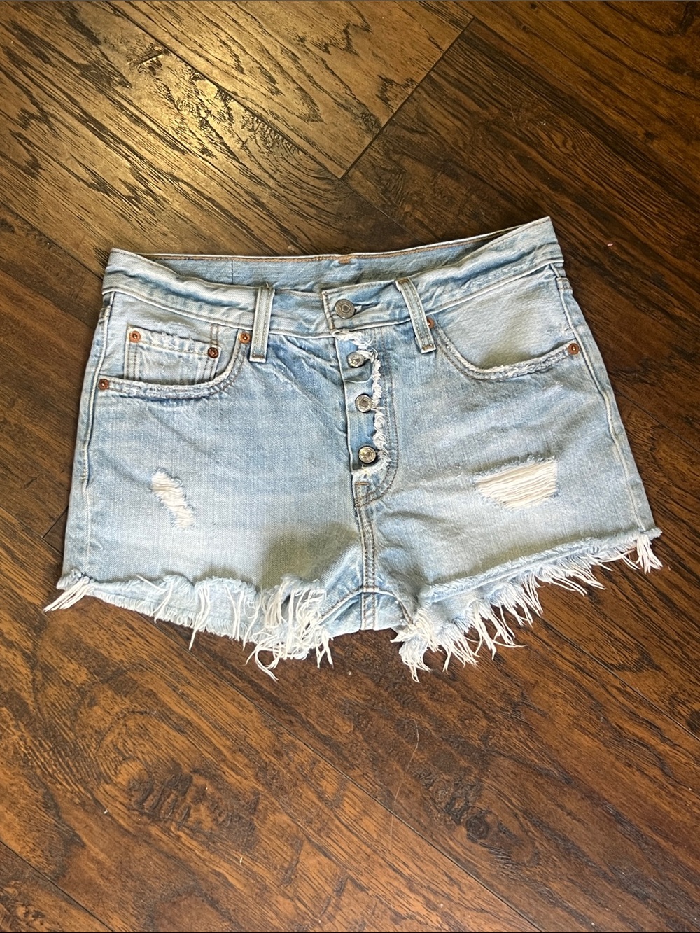 Levi’s 501 button fly Distressed shorty shorts woman’s size 27